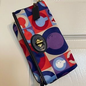 Coach clutch purse multicolor.